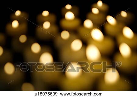 Lit candles, blurred motion View Large Photo Image Stock Photo - Lit candles, blurred motion. Fotosearch