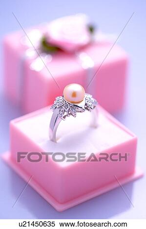 Stock Photography - Diamond ring in box, close-up . Fotosearch