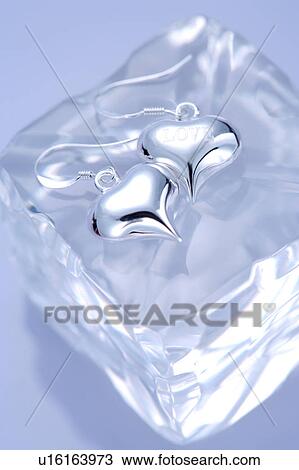 Heart shaped earrings View Large Photo Image Stock Image - Heart shaped earrings. Fotosearch