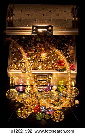 Stock Image - Jewelry in treasure chest . Fotosearch