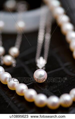 Pearl necklace and pendant, close-up View Large Photo Image Stock Image - Pearl necklace and pendant, close-up. Fotosearch
