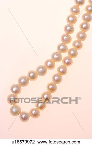 Stock Image - Pearl necklace, close-up. Fotosearch