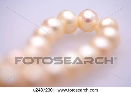 Pearl necklace, close-up View Large Photo Image Stock Image - Pearl necklace, close-up. Fotosearch