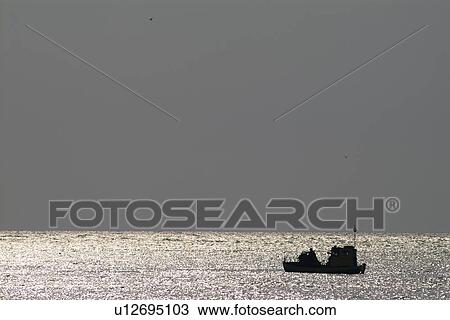 Fishing boat in ocean View Large Photo Image Stock Image - Fishing boat in ocean . Fotosearch