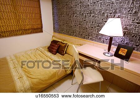 Bed by table and chair View Large Photo Image Stock Image - Bed by table and chair. Fotosearch