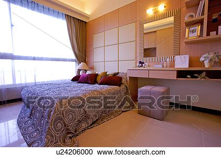 Stock Image - Bedroom with make-up desk. Fotosearch