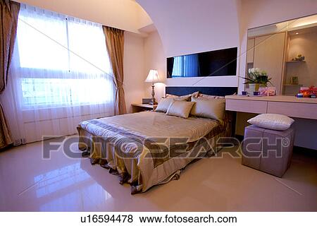 Stock Photo - Bedroom with make-up desk. Fotosearch