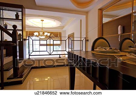 Stock Image - Dining room in modern home. Fotosearch