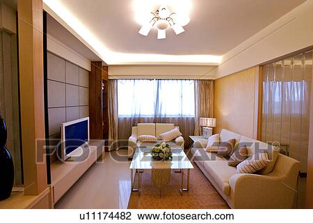 Stock Image - Living room in modern home . Fotosearch
