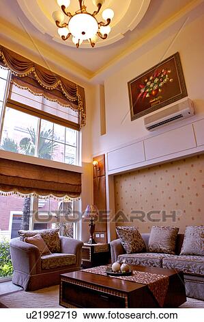 Stock Photo - Living room in modern home . Fotosearch