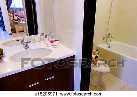Stock Image - Wash room and toilet. Fotosearch