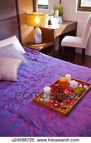 A tray of flowers and decorations on the bed View Large Photo Image Stock Photography - A tray of flowers and decorations on the bed. Fotosearch