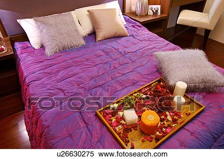 A tray of flowers and decorations on the bed View Large Photo Image Stock Photography - A tray of flowers and decorations on the bed. Fotosearch