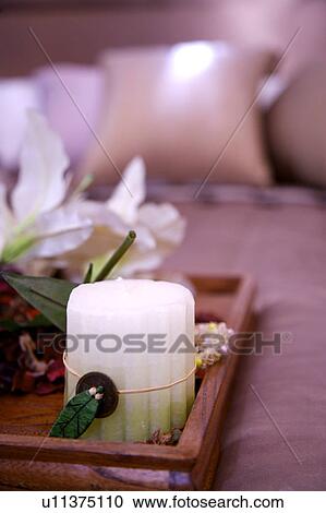 Bed with tray of candle and flowers View Large Photo Image Stock Image - Bed with tray of candle and flowers. Fotosearch