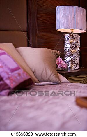 Stock Photo - Bedroom details and decorations. Fotosearch
