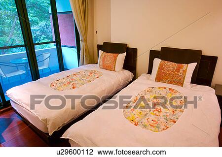 Stock Image - Bedroom with balcony. Fotosearch