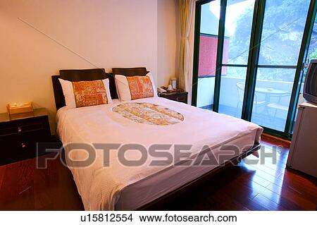 Picture - Bedroom with French window. Fotosearch