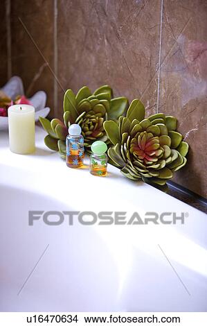Candle and decorations on bathtub View Large Photo Image Picture - Candle and decorations on bathtub. Fotosearch