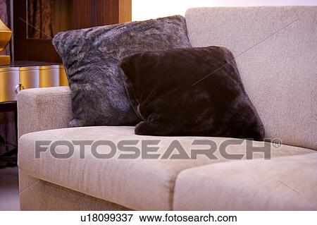 Couch with two pillows on it View Large Photo Image Stock Photo - Couch with two pillows on it. Fotosearch