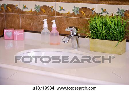 Details and decorations of a bathroom sink View Large Photo Image Picture - Details and decorations of a bathroom sink. Fotosearch