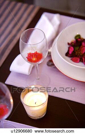 High angle view of dining table, with glasses and candle View Large Photo Image Stock Image - High angle view of dining table, with glasses and candle. Fotosearch