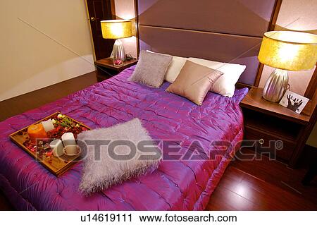 Stock Image - Interior of bedroom. Fotosearch