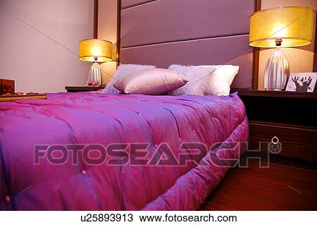 Stock Image - Interior of bedroom. Fotosearch