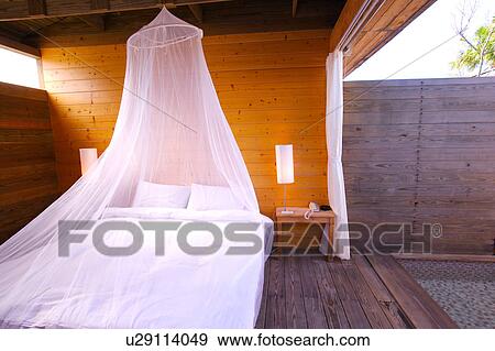 Mesh netting over bed View Large Photo Image Stock Photo - Mesh netting over bed. Fotosearch