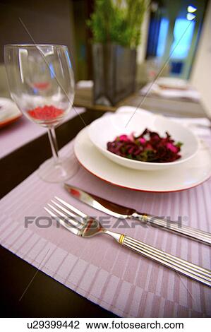 Stock Image - Place setting on dining table. Fotosearch