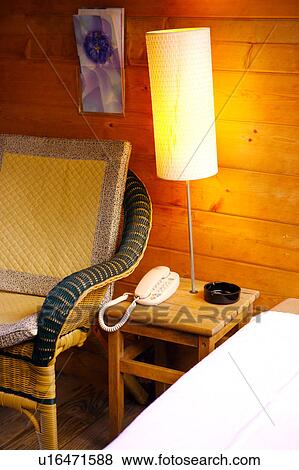 Telephone on a bedside table View Large Photo Image Stock Photo - Telephone on a bedside table. Fotosearch