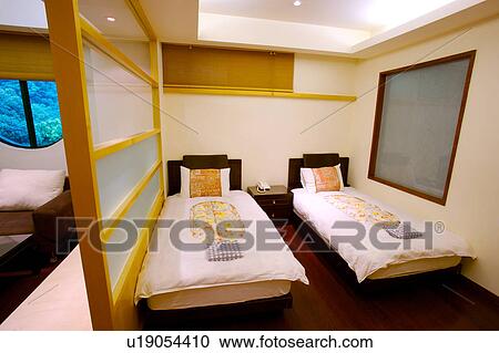Stock Image - Two beds bedroom. Fotosearch