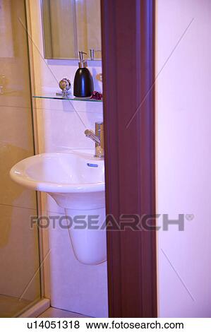 View of a bathroom from the doorway View Large Photo Image Stock Photo - View of a bathroom from the doorway. Fotosearch