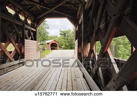 Stock Image - Ferme-Rouge twin cover bridge, Laurentides region, Kiamika, Quebec, Canada.. Fotosearch