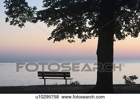 Stock Photo - Park and bench on the shores of Lake Ontario - Niagara-on-the-Lake - Ontario, Canada. Fotosearch