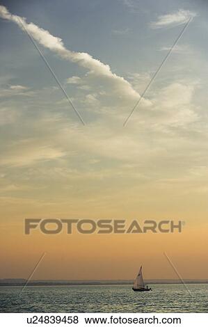 Stock Photo - Sailboat on Lake Ontario - St. Catharines Ontario, Canada. Fotosearch