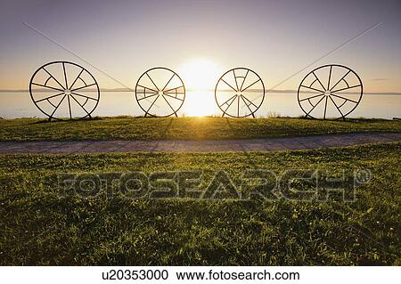 Stock Image - View of sunset over St. Lawrence river, Bas-Saint-Laurent region, Quebec, Canada. Fotosearch