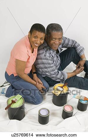 African American Couple Doing Home Improvement Painting, Canada, British Columbia View Large Photo Image Picture - African American Couple Doing Home Improvement Painting, Canada, British Columbia. Fotosearch
