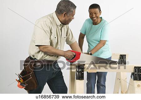 African American Couple Doing Home Improvement, Canada, British Columbia View Large Photo Image Stock Photo - African American Couple Doing Home Improvement, Canada, British Columbia. Fotosearch