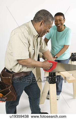 African American Couple Doing Home Improvement, Canada, British Columbia View Large Photo Image Stock Photo - African American Couple Doing Home Improvement, Canada, British Columbia. Fotosearch