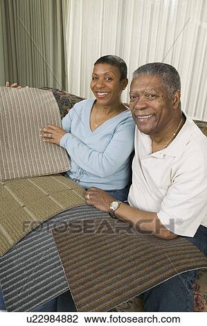 African American couple going over carpet samples, Vancouver, BC View Large Photo Image Stock Image - African American couple going over carpet samples, Vancouver, BC. Fotosearch
