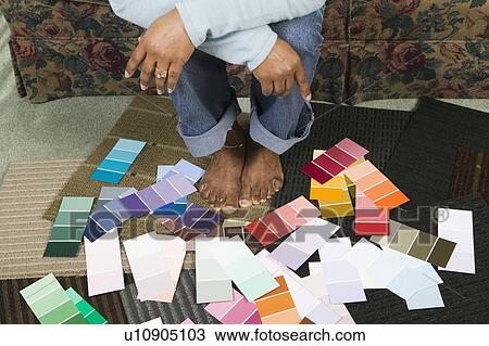 African American going over paint colour swatches, Vancouver, BC View Large Photo Image Stock Image - African American going over paint colour swatches, Vancouver, BC. Fotosearch