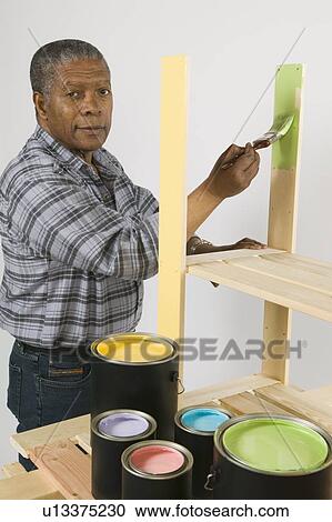 African American Man Doing Home Improvement Painting, Canada, British Columbia View Large Photo Image Stock Image - African American Man Doing Home Improvement Painting, Canada, British Columbia. Fotosearch