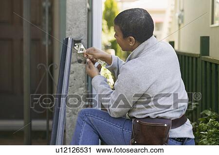 African American woman doing home improvement, Vancouver, BC View Large Photo Image Stock Image - African American woman doing home improvement, Vancouver, BC. Fotosearch