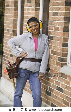 African American woman doing home improvement, Vancouver, BC View Large Photo Image Stock Photo - African American woman doing home improvement, Vancouver, BC. Fotosearch