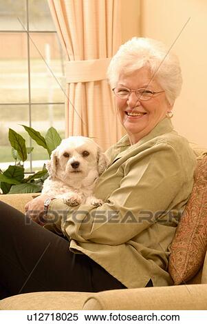 Senior Woman white dog, Regina, Saskatchewan View Large Photo Image Stock Photography - Senior Woman white dog, Regina, Saskatchewan. Fotosearch