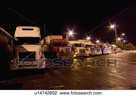 Parking lot for transport trucks at night; Canada, Ontario View Large Photo Image Stock Image - Parking lot for transport trucks at night; Canada, Ontario. Fotosearch