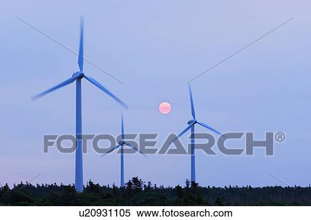 Stock Photography - Sunrise over wind turbines. North Cape, PEI. Fotosearch