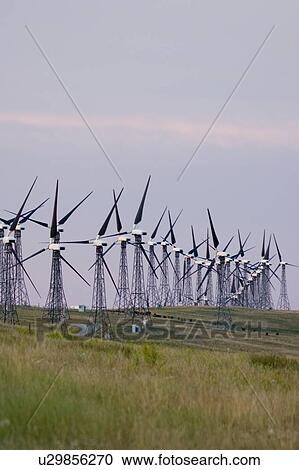 Stock Image - Windmills used to generate electrical power at Cowley Ridge in southern Alberta, Canada. Fotosearch