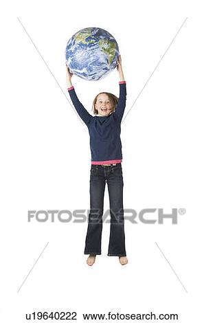 9 years old girl jumping with the globe View Large Photo Image Stock Image - 9 years old girl jumping with the globe. Fotosearch