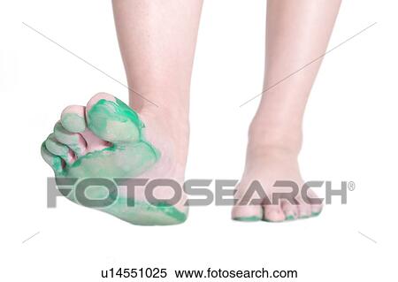 Stock Photography - Feet showing green on the underside. Fotosearch